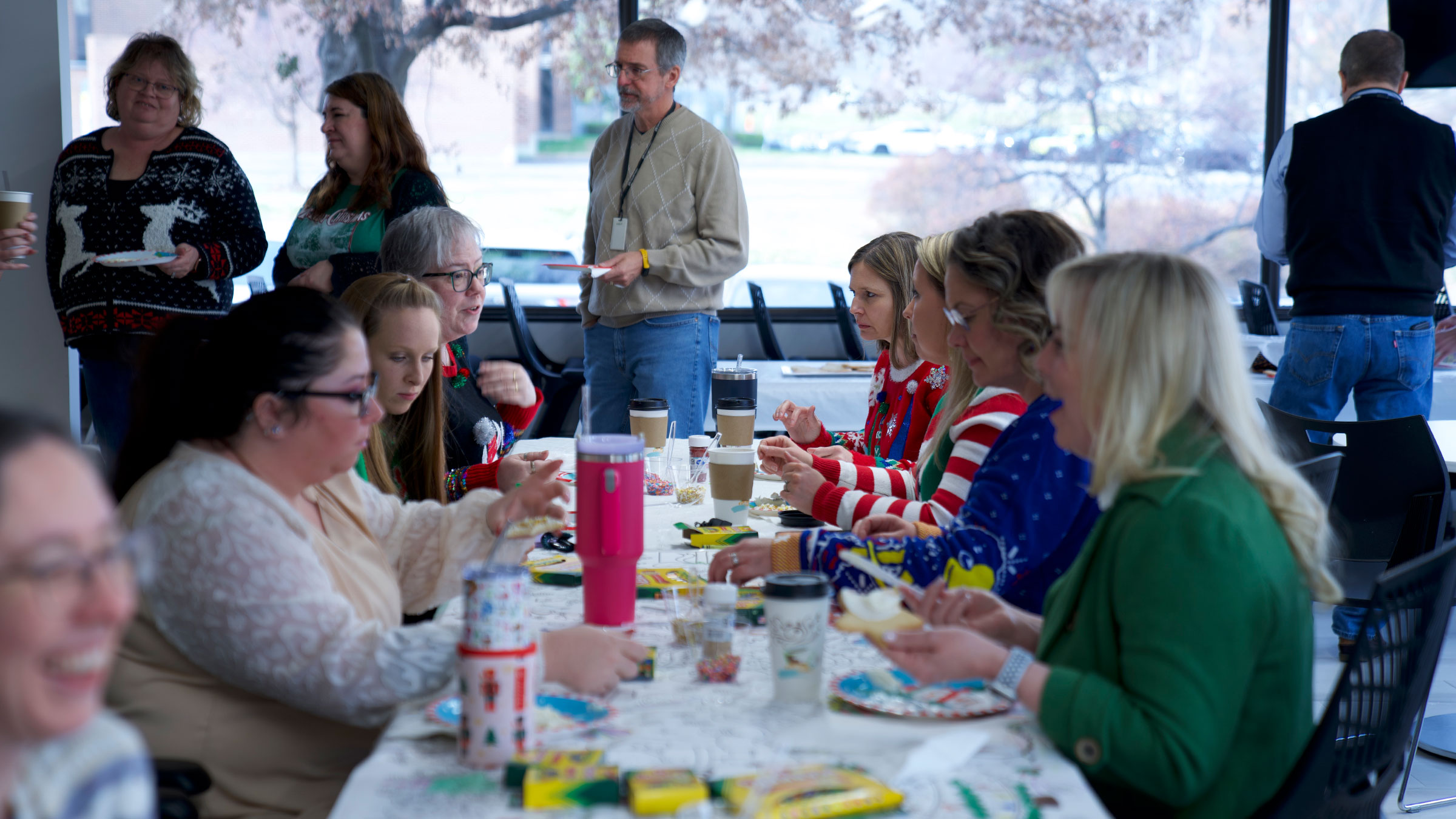 SkillPath employees decorating holiday cookies