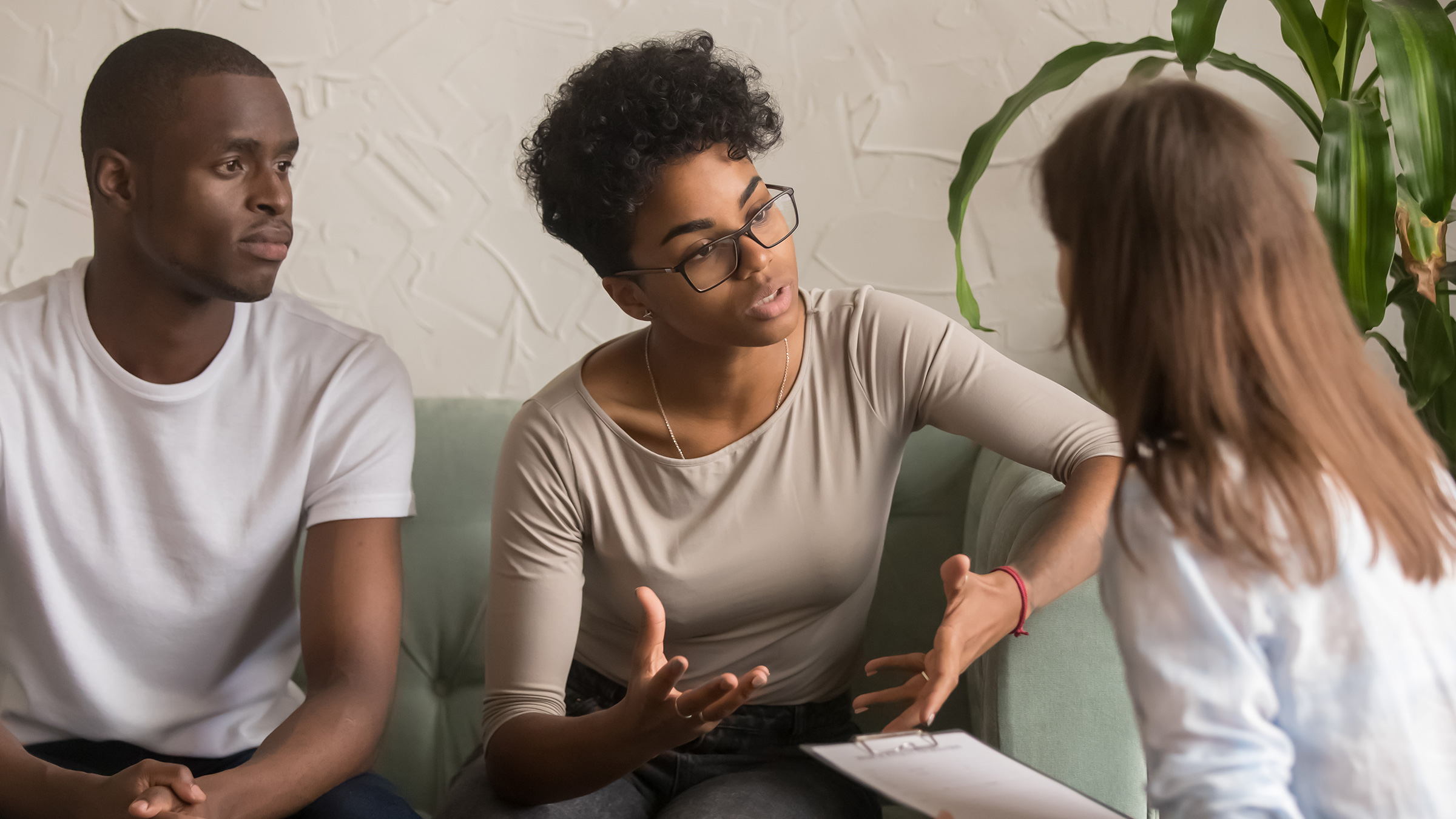 three work colleagues in conversation
