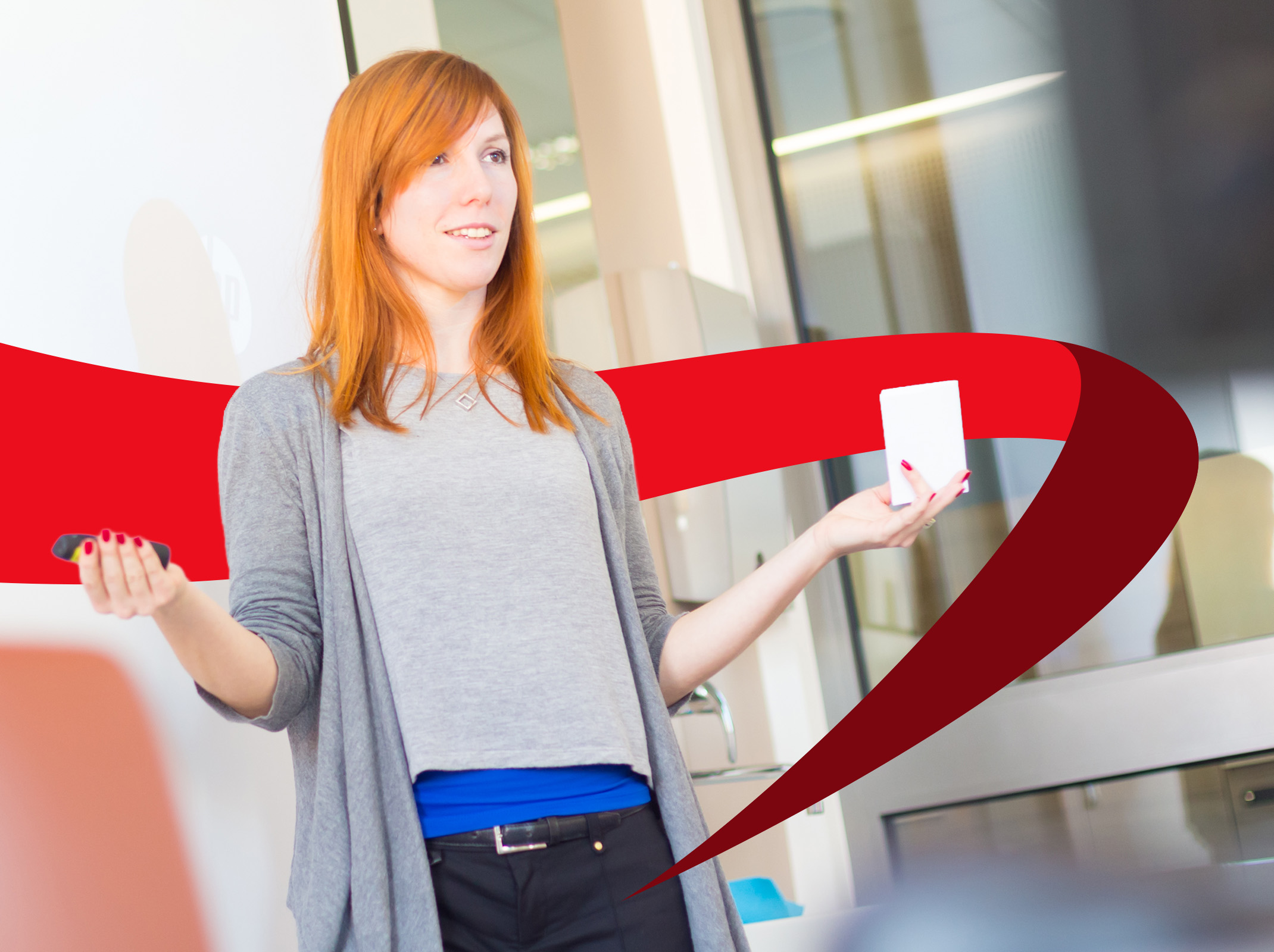 A female instructor delivers business training for a professional development session.