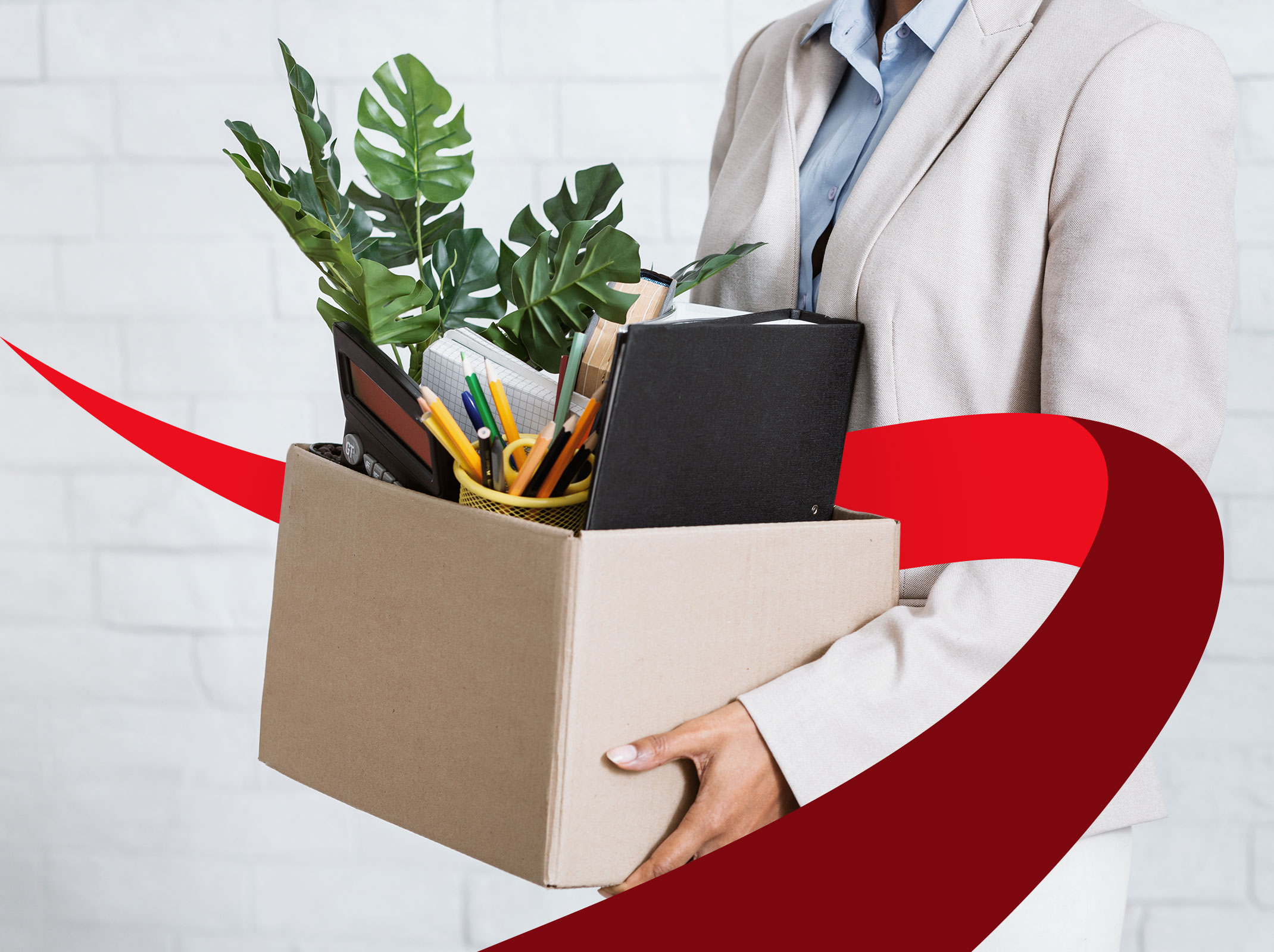 Woman with box of personal items
