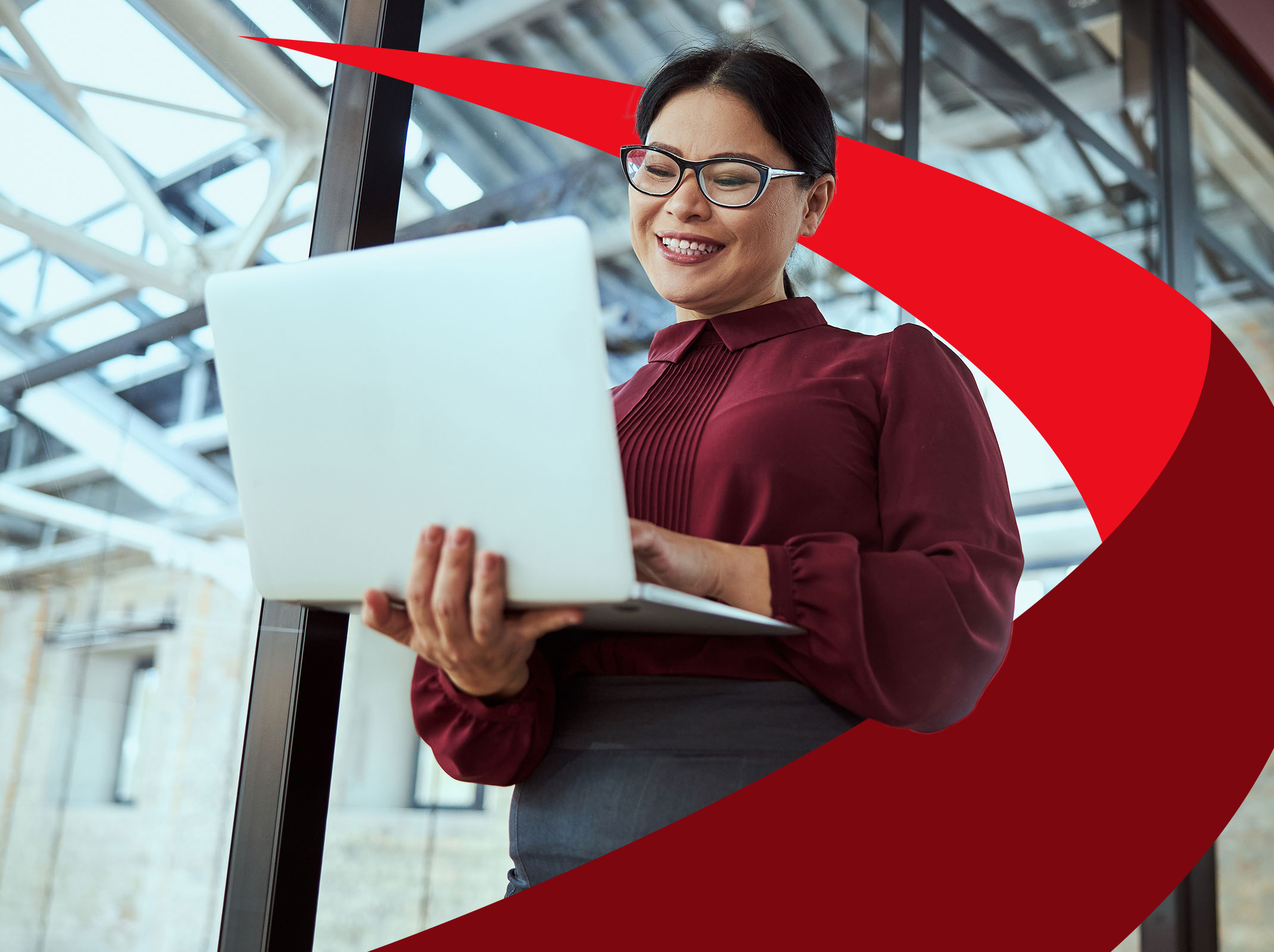 Young Asian woman holding a laptop