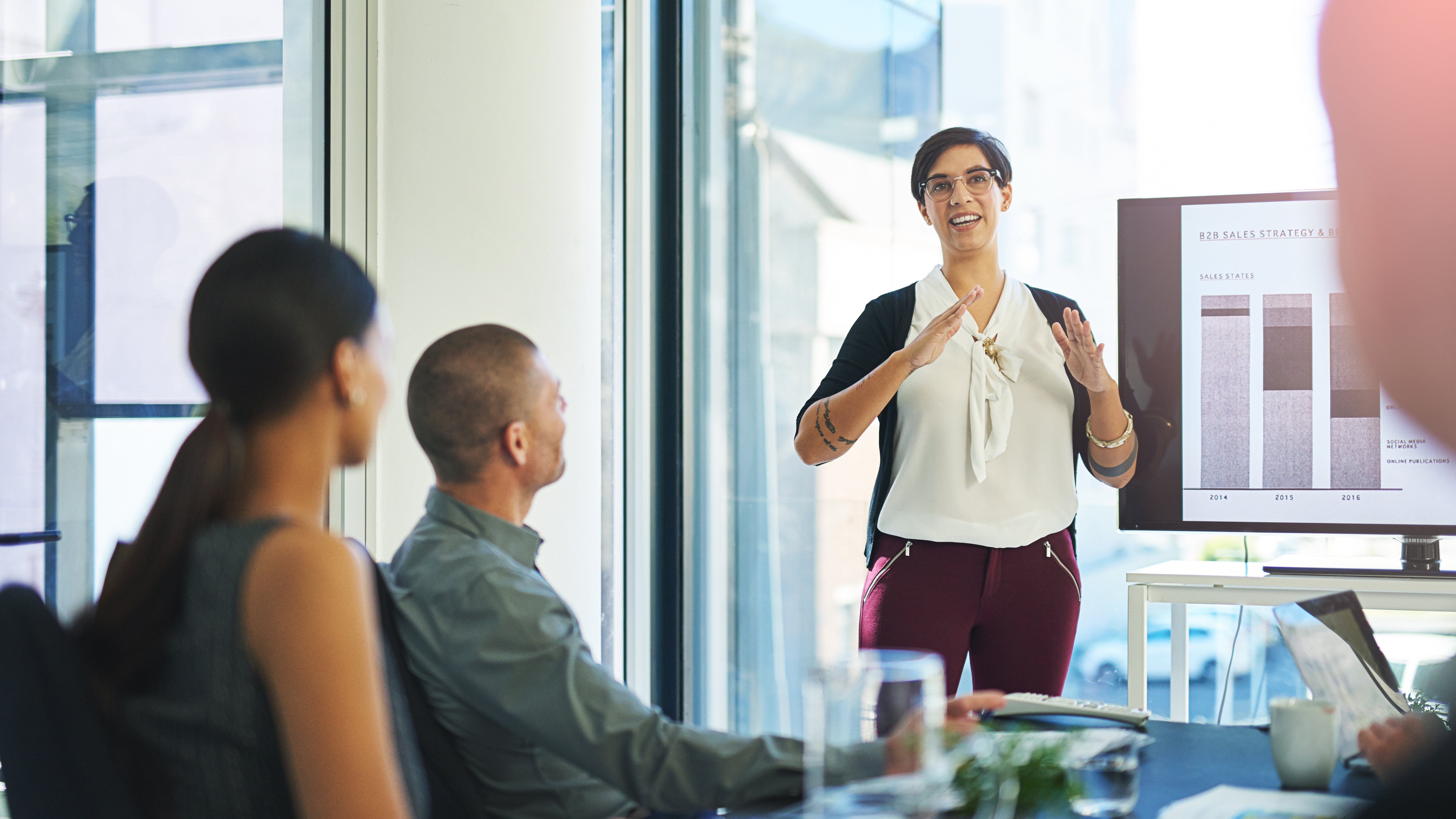 A woman presenting an idea in a meeting