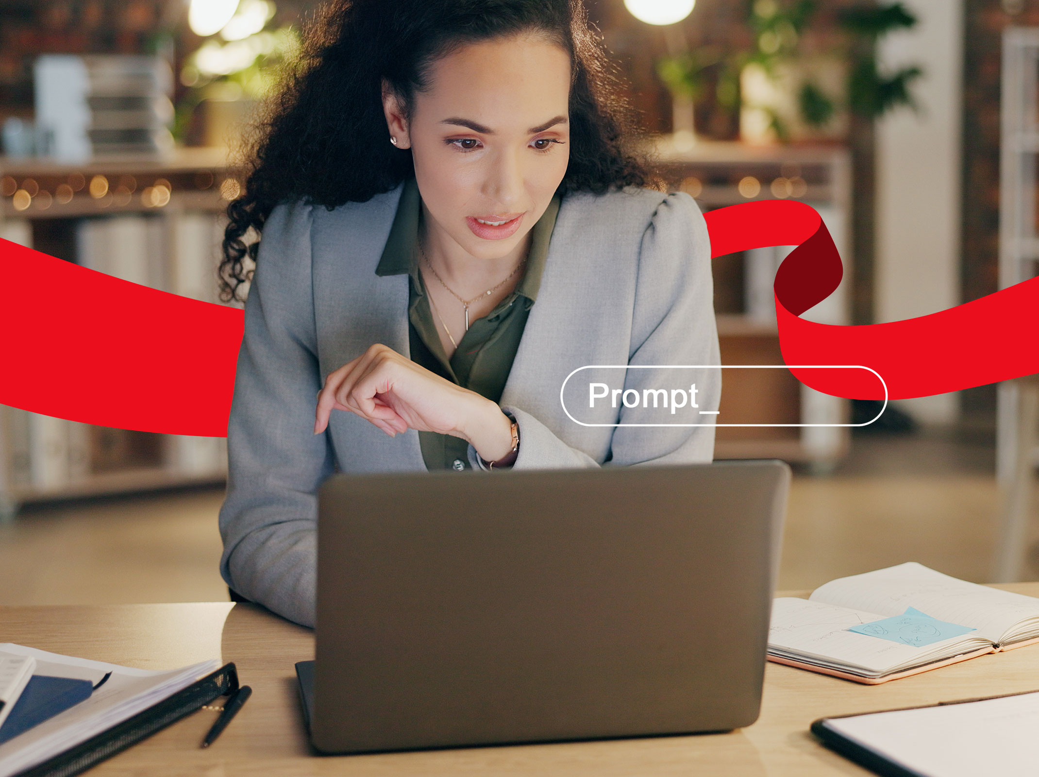 Administrative professional typing a prompt into her office laptop