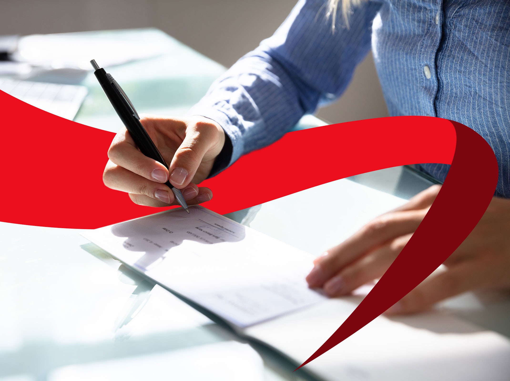 Payroll professional writing a check