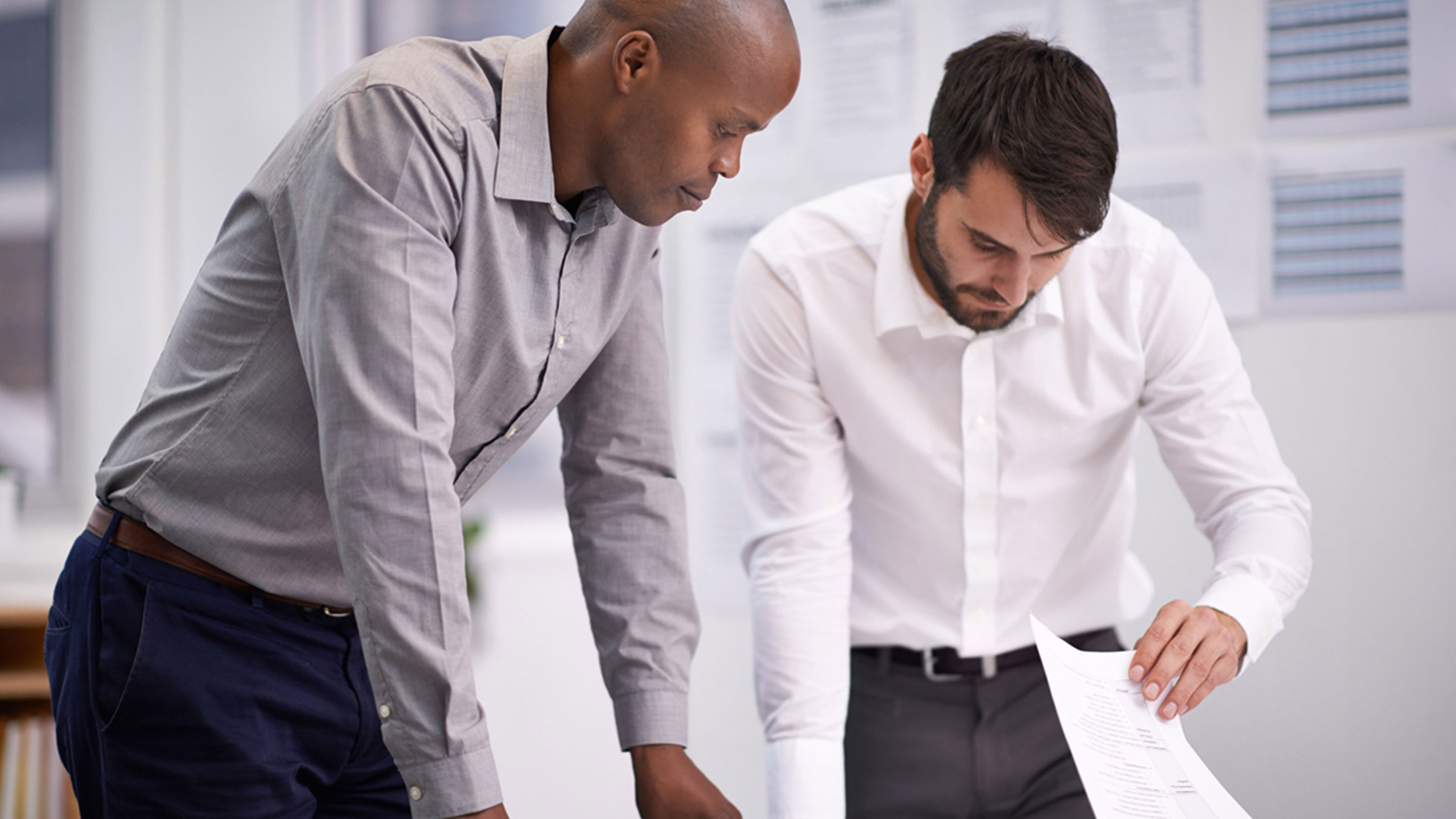 Manager and employee going over performance improvement plan